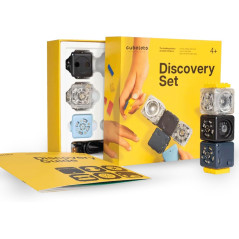 Colorful Cubelets Discovery Set with interactive blocks and guidebook on yellow background.